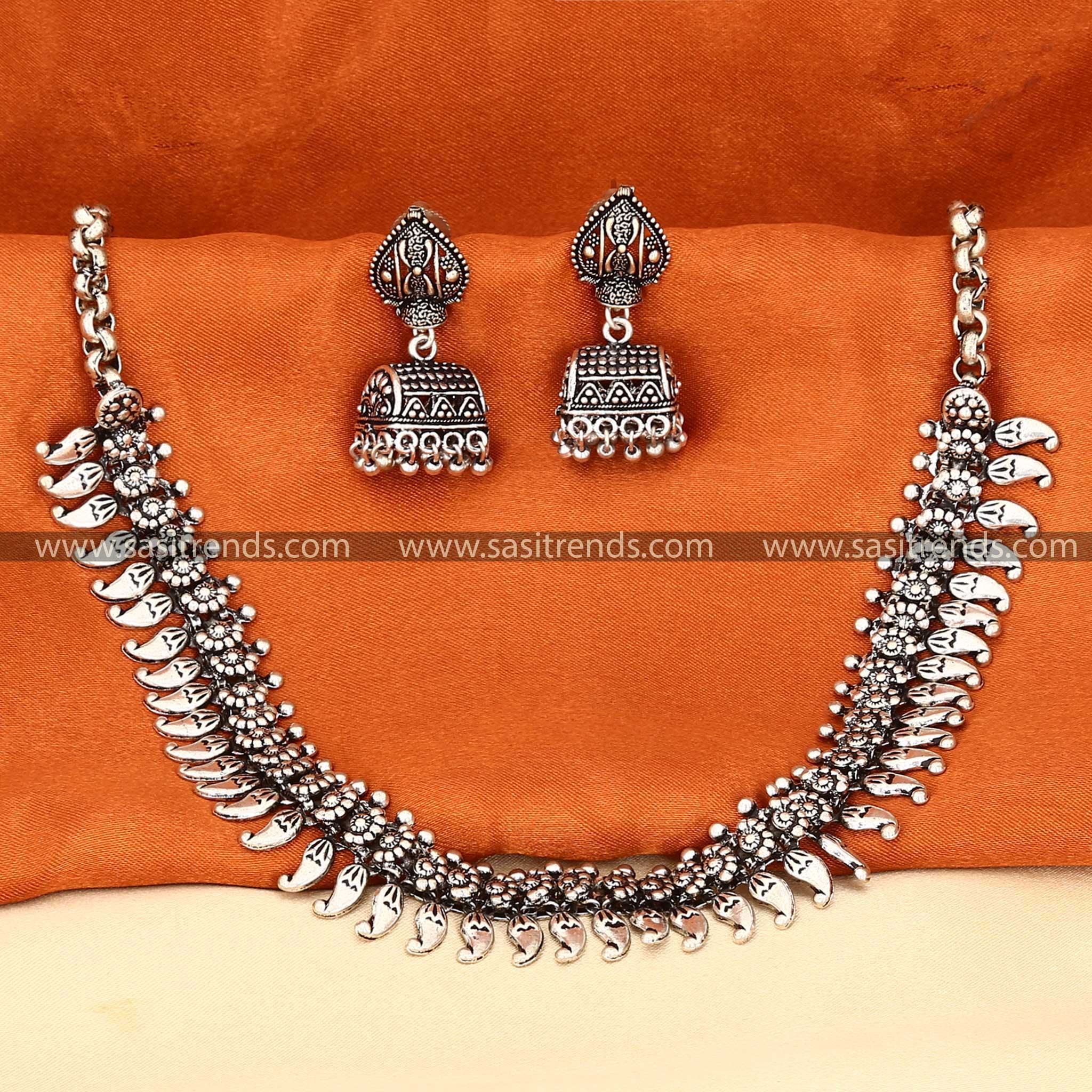 Elegant floral oxidised silver jewellery set with heritage design 