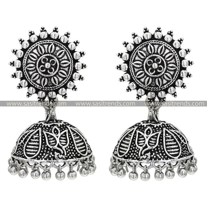 Traditional oxidised silver jhumkas featuring chara tops adorned with a delicate leaf design, perfect for ethnic wear