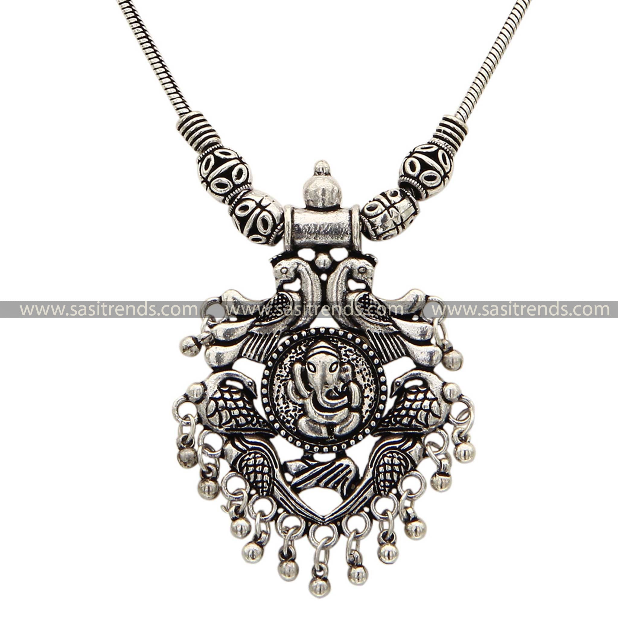 Elegant oxidised necklace with embossed Ganesha and peacock designs