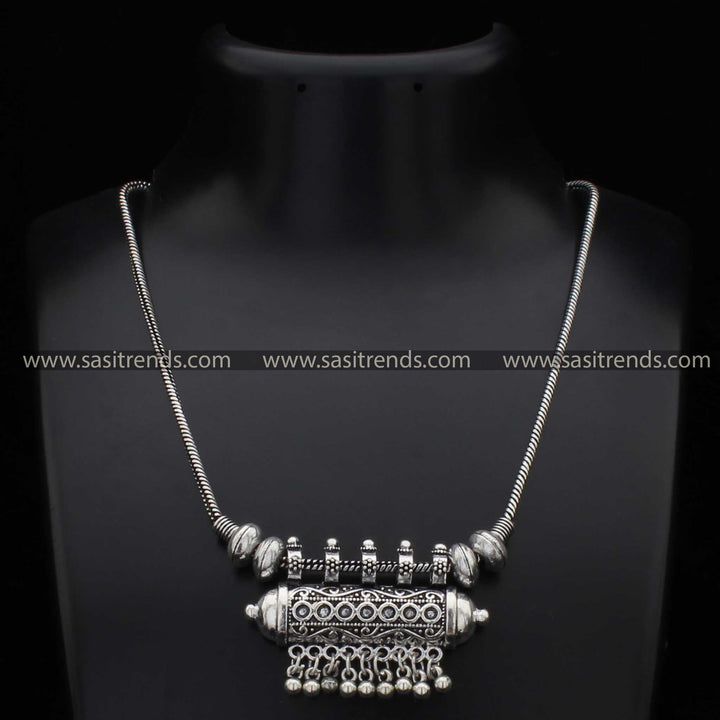 Oxidised necklace with an elegant floral pendant and beaded fringe navarathiri special jewellery