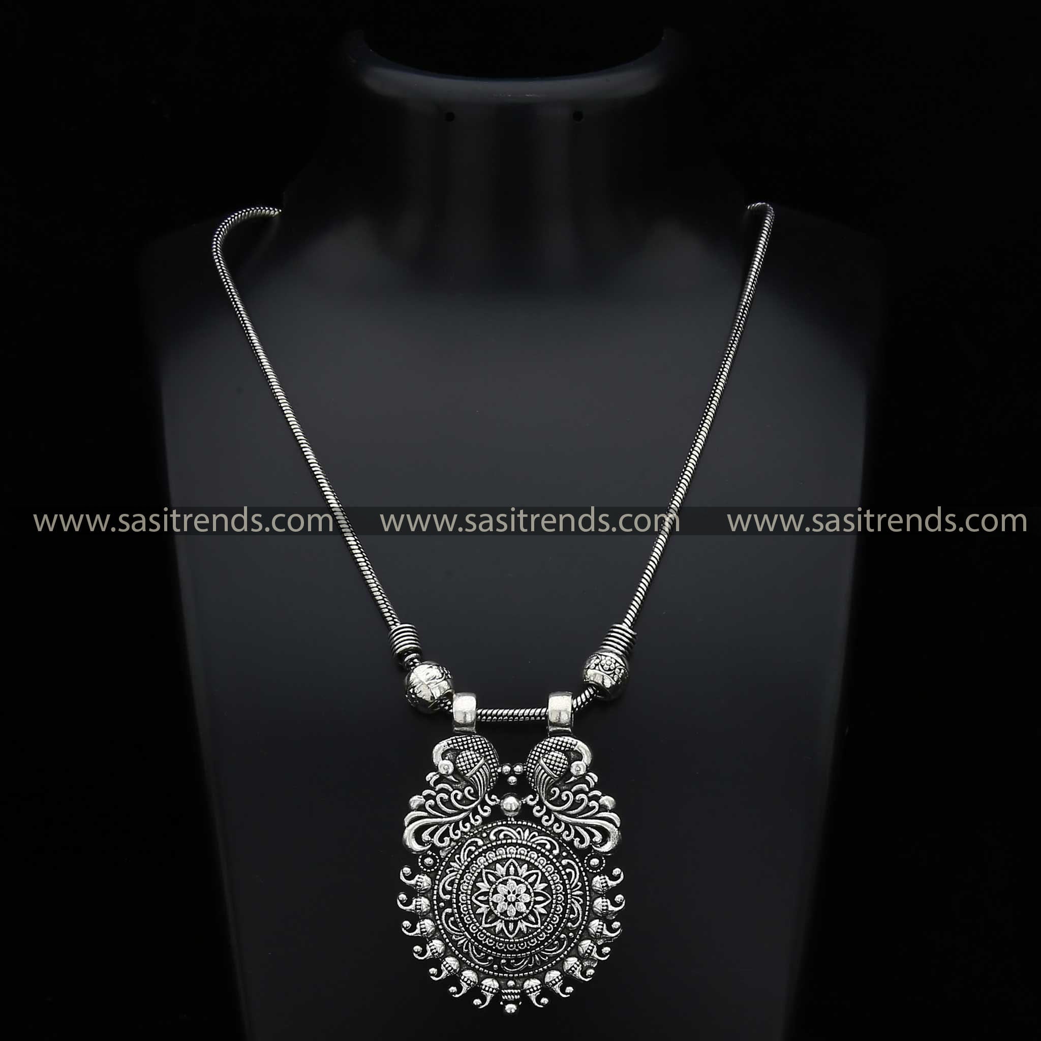 Mayurika Oxidised Silver Pendant with Floral and Mango Motifs Navarathiri Special Necklace