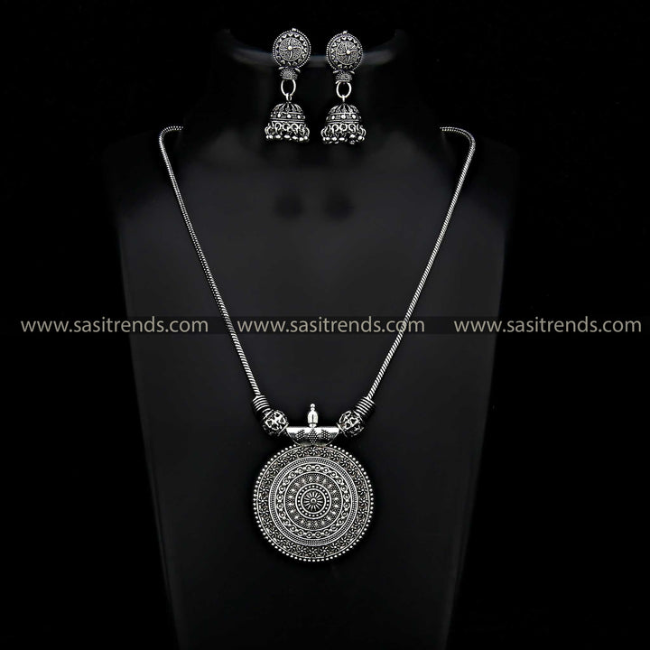 Roopasi Oxidised Silver Set with Small Chakra Pendant and Jhumka Earrings Jewellery Set