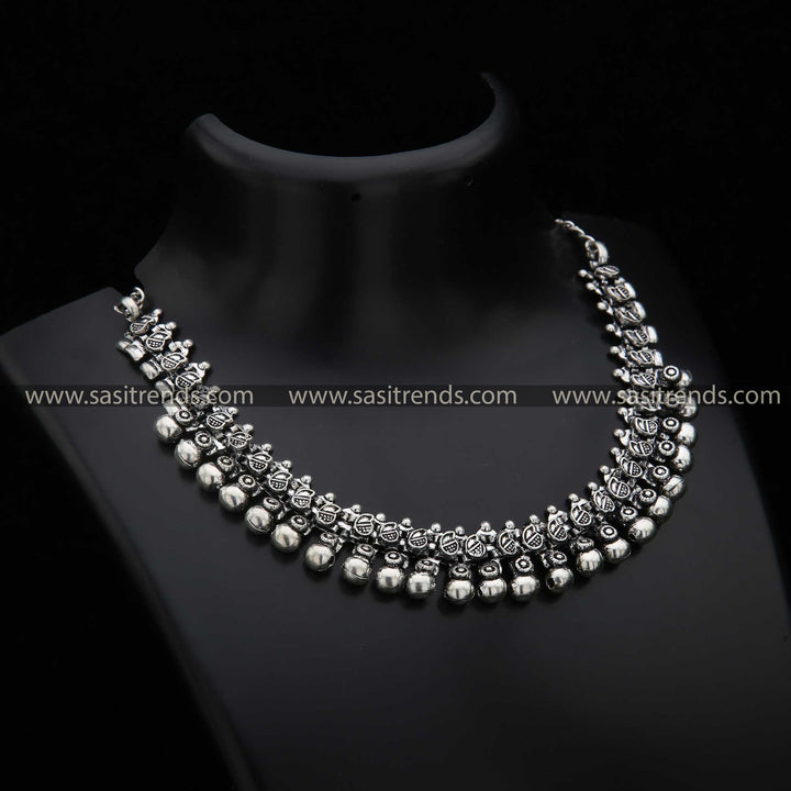 Taralini Oxidised Silver Ball Necklace with Intricate Detailing Navarathiri Special Necklace