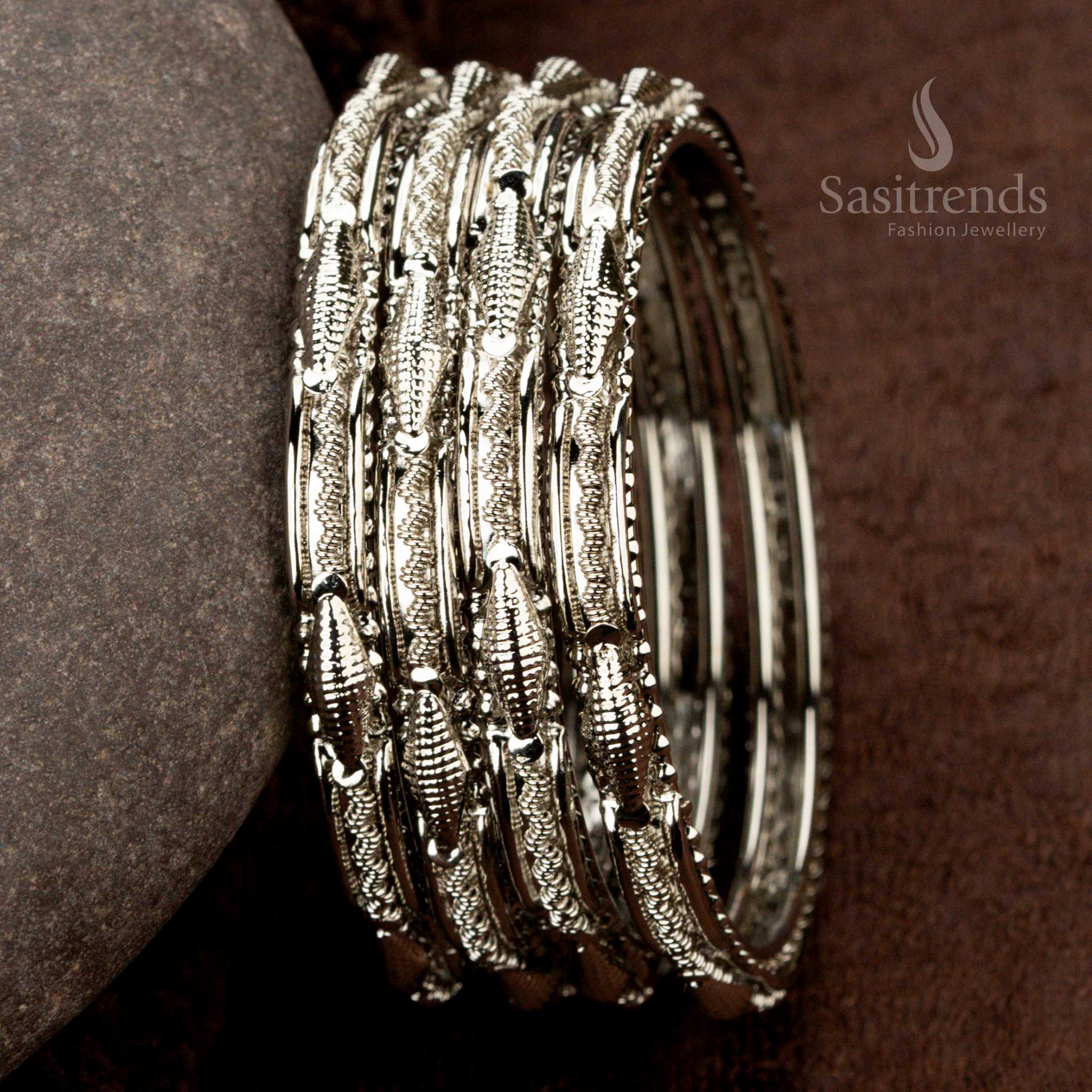 Elegant oxidised bangles set with intricate detailing for Navaratri - Sasitrends