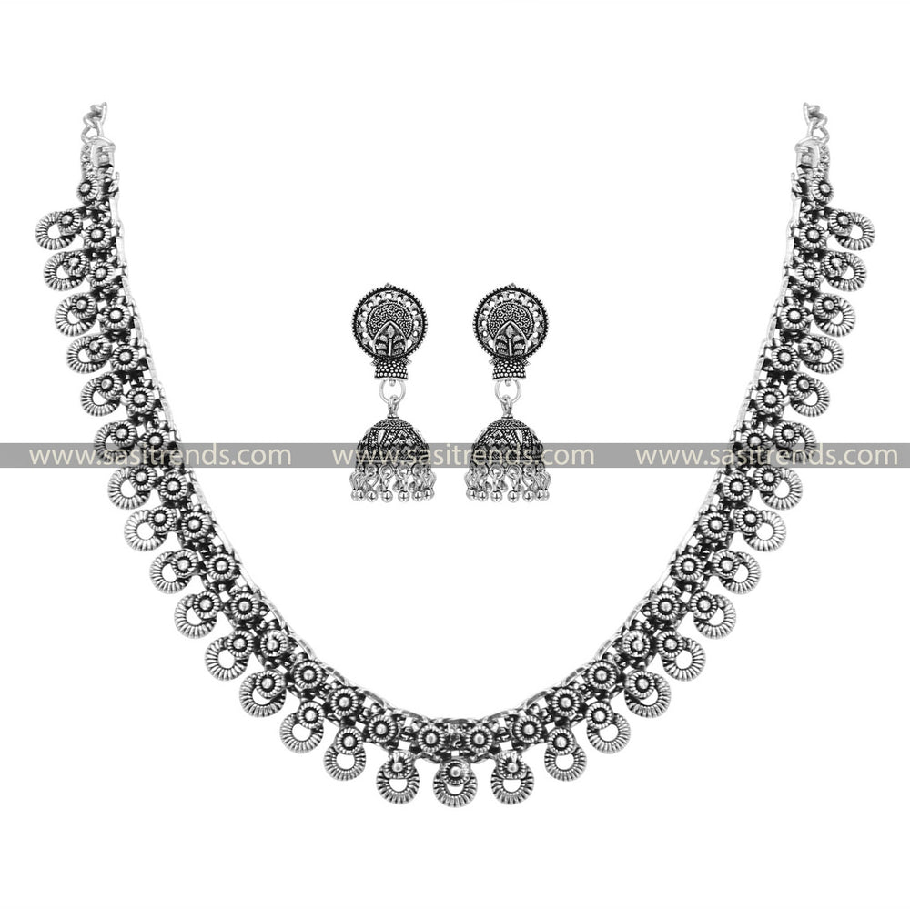 Tribal Pattern Oxidised Choker and Jhumka Set in Silver by Tanvi