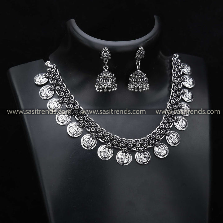 Dual-Finish Lakshmi Gap Coin Necklace & Peacock Jhumkas Jewellery Set - Oxidised Silver/Antique Gold