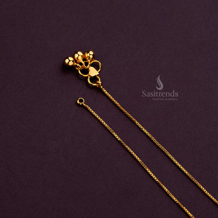 Stylish micro gold thin chain anklets worn with traditional attire for a festive look - Sasitrends