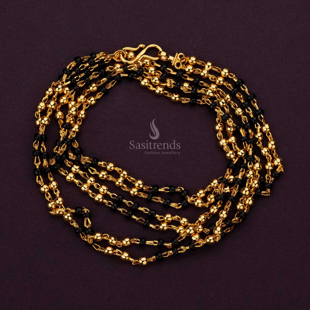 Elegant micro gold plated chain with black and gold beads, perfect for festive occasions - Sasitrends