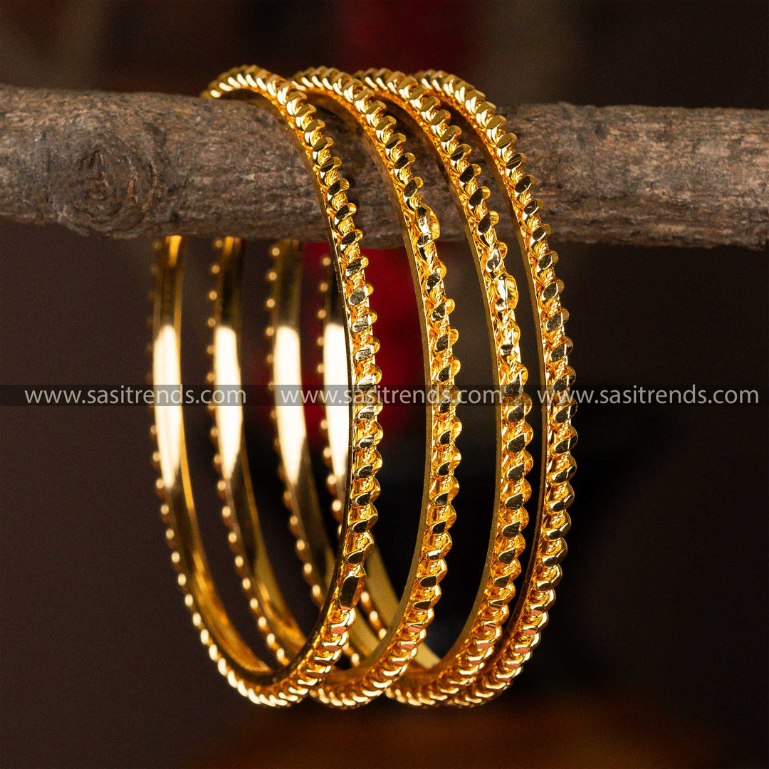 Four-piece set of twisted micro gold-plated kada bangles, shimmering with a delicate twist pattern