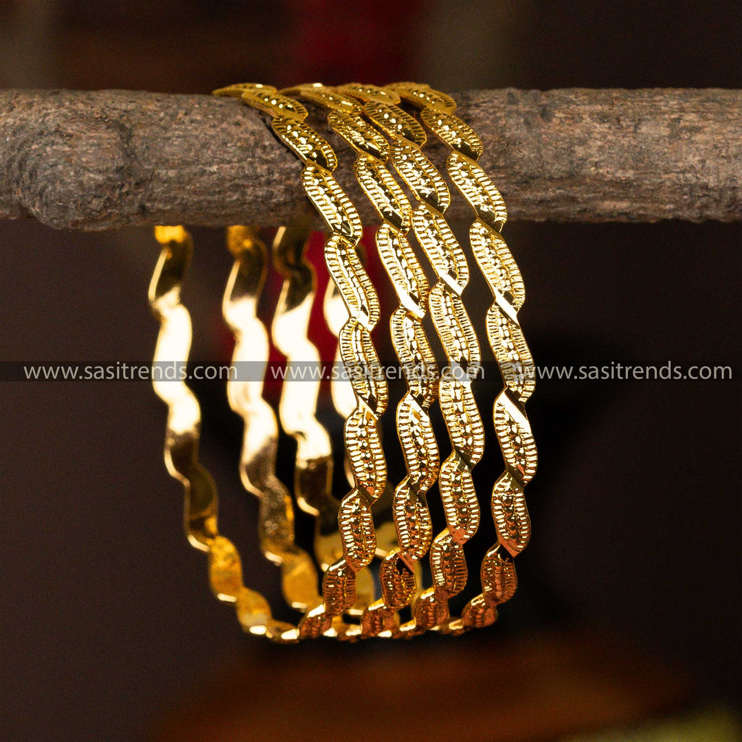 Quartet of 1-gram micro gold-plated bangles with unique embossed designs