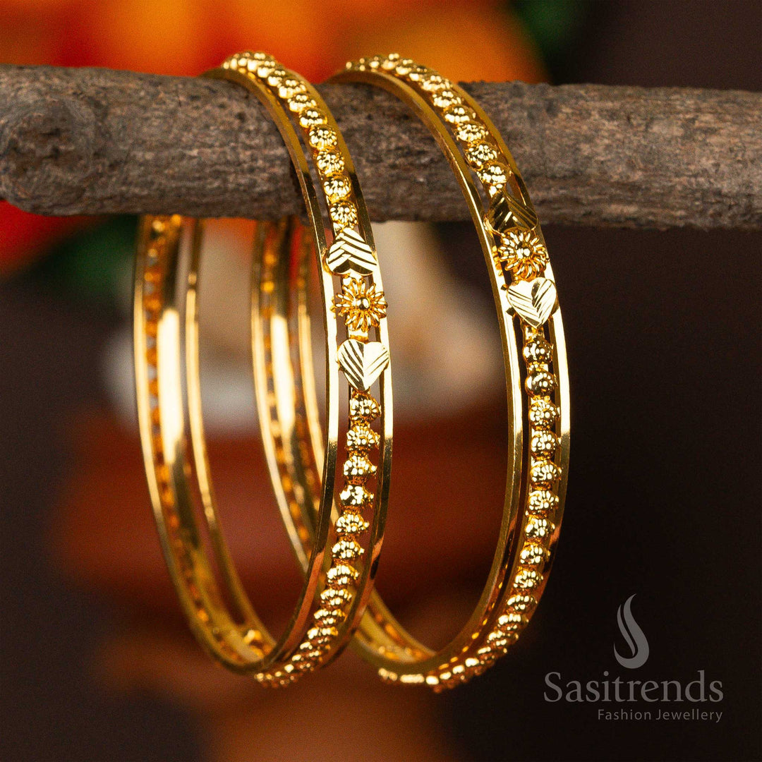 Dazzling micro gold-plated bangles with floral patterns, set against a warm backdrop - Sasitrends