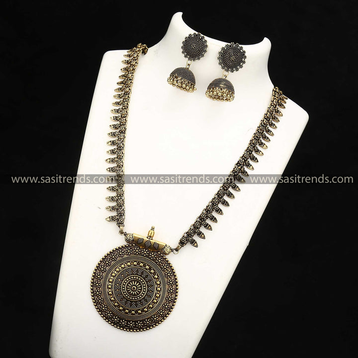 Niranjana Antique Gold Long Haram with Nayanthara Jhumka Earrings Jewellery Set Navarathiri Elegance