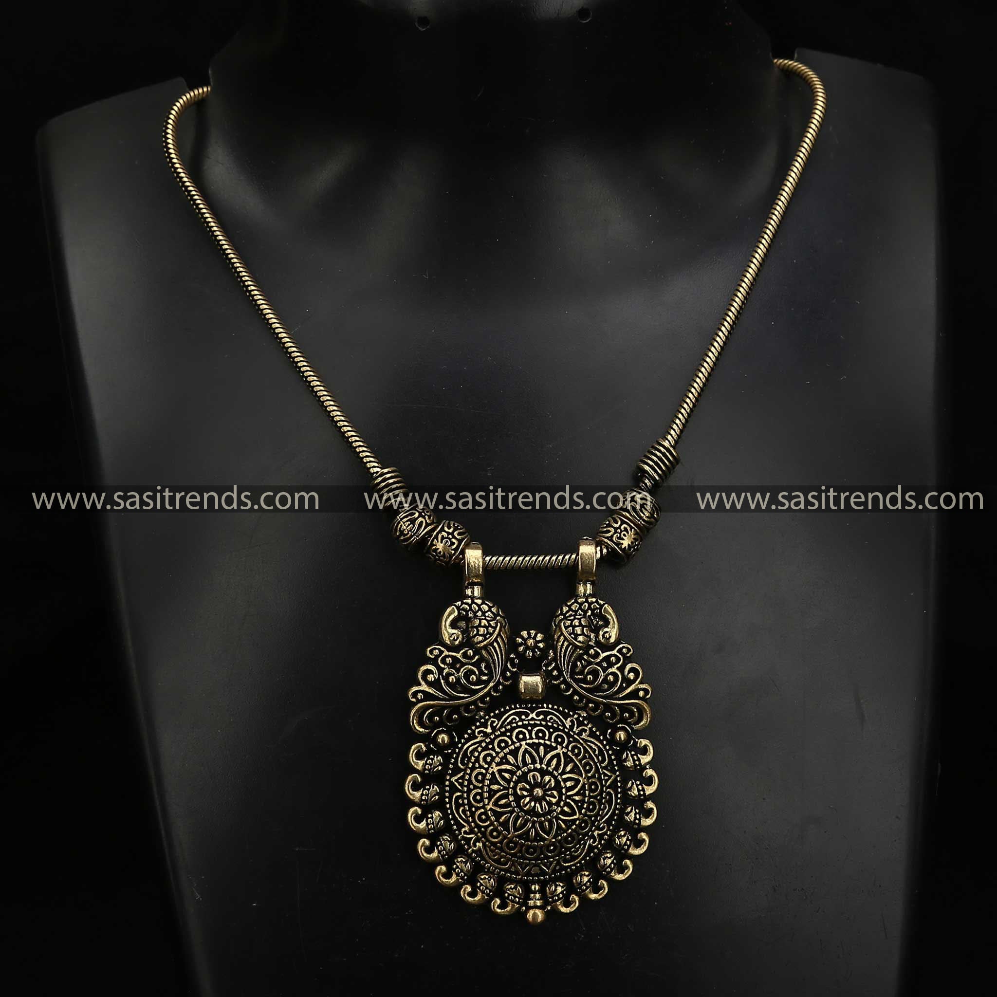 Mayurika Oxidised Antique Gold Pendant with Floral and Mango Motifs Navarathiri Special Necklace