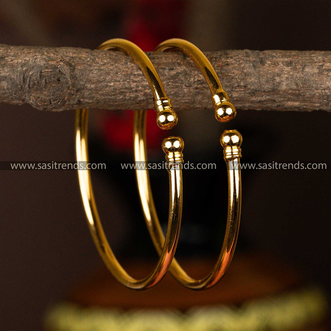 Micro gold-plated kada bangles featuring elegant sleek orb details