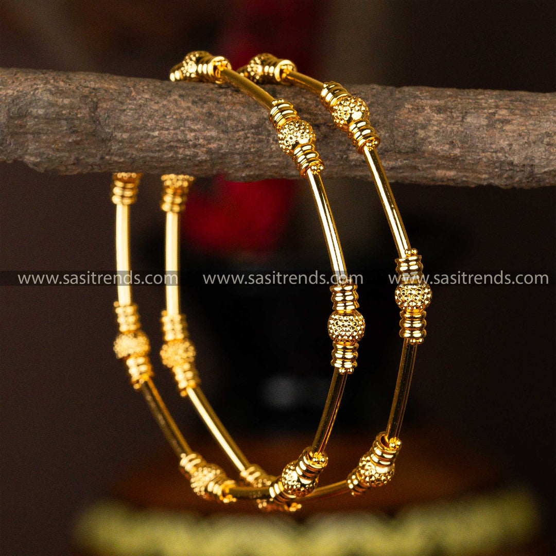 Micro gold-plated kada bangles adorned with intricate beaded detailing