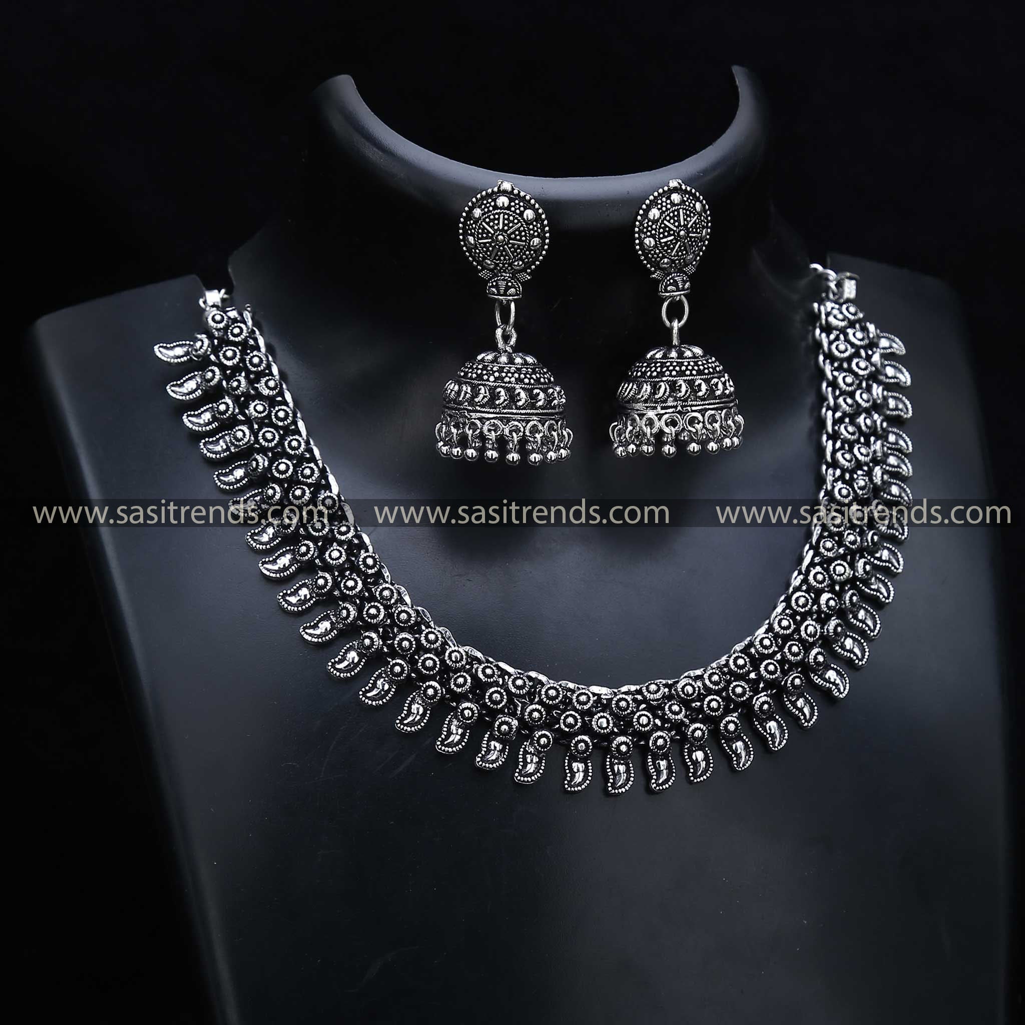 Ornate Oxidised Silver Necklace Set 1208B, comes with complementary jhumka earrings, showcasing intricate craftsmanship under oxidised jewellery