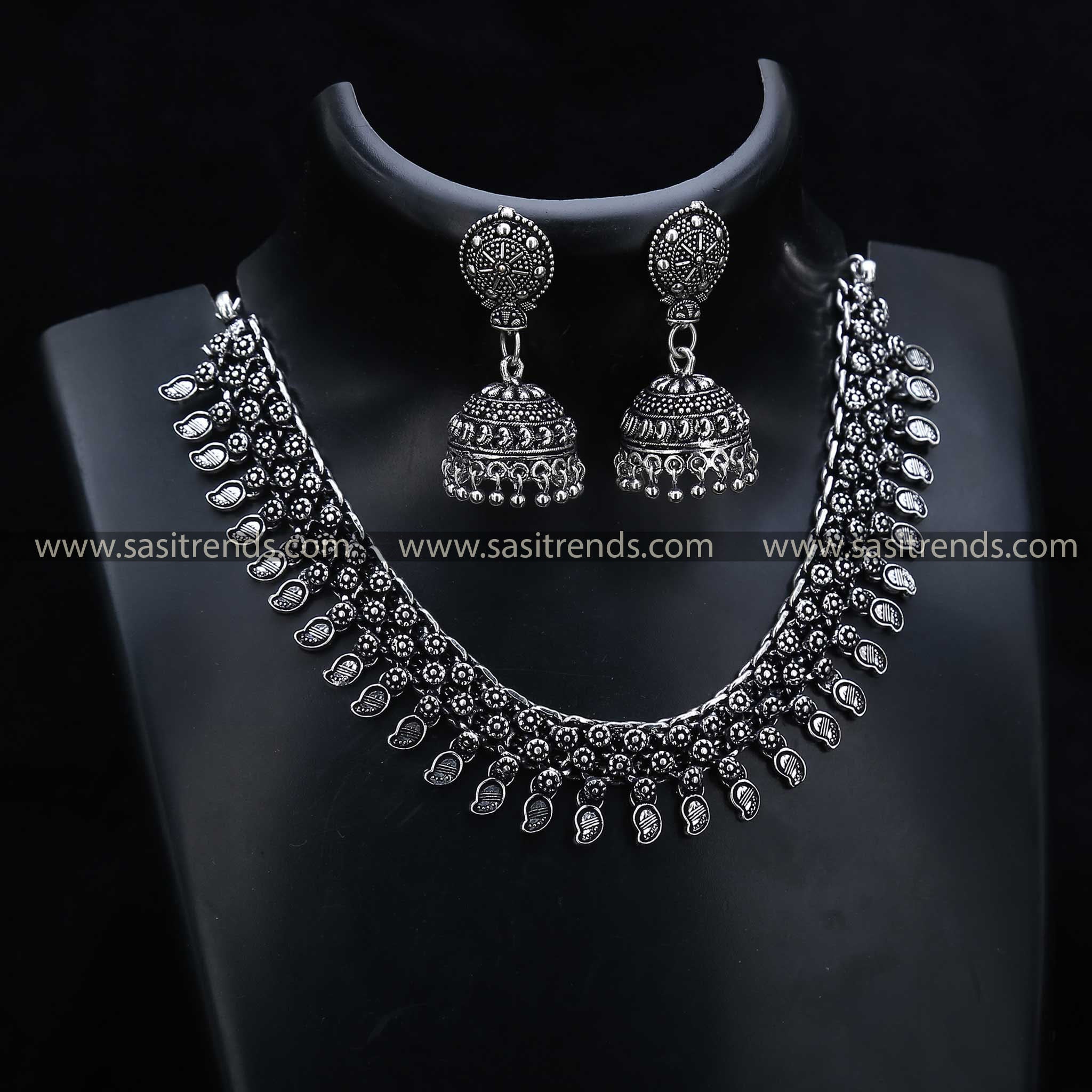 Oxidised Jewellery Set 1208C, showcasing peacock feather motifs on the necklace and jhumkas, a popular theme in oxidised jewellery