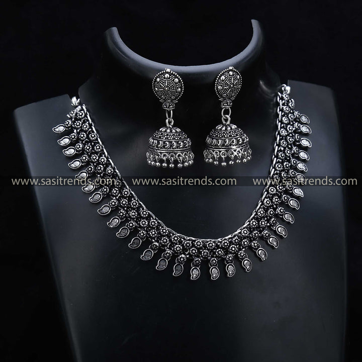 Oxidised Jewellery Set 1208C, showcasing peacock feather motifs on the necklace and jhumkas, a popular theme in oxidised jewellery