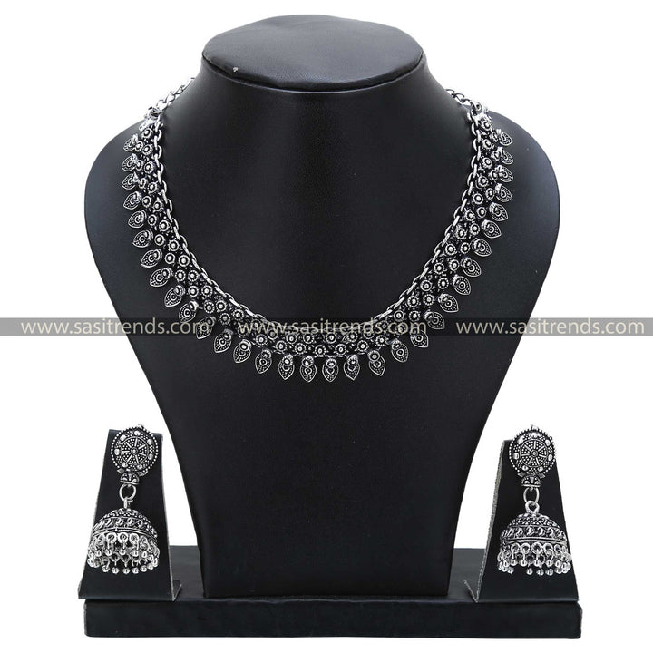 Oxidised Silver Floral Finesse Jewellery Set 1208E, featuring a necklace and jhumkas with floral patterns, a popular selection in oxidised jewellery