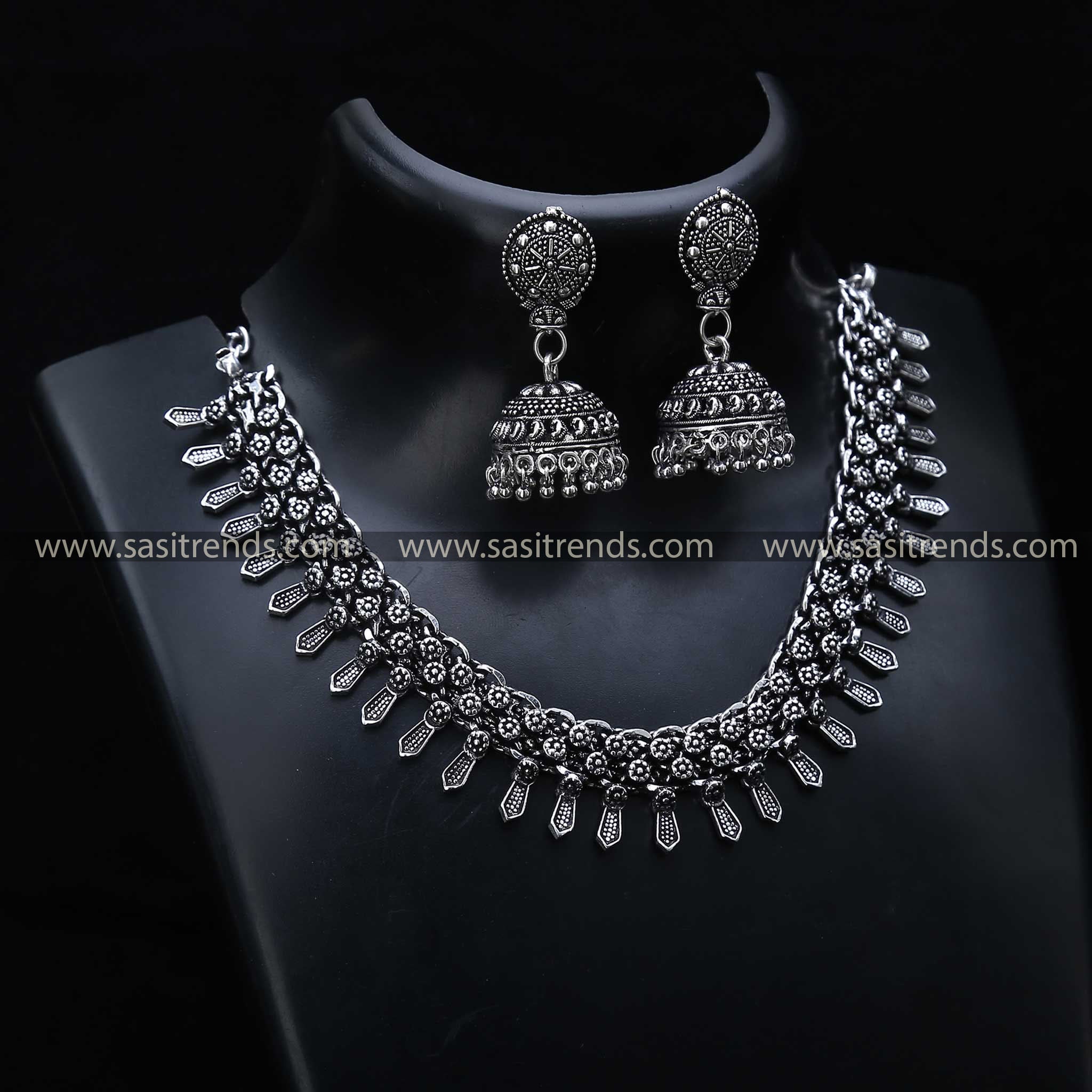 Oxidised Tribal Dance Necklace Set 1208F, comes with matching jhumka earrings, offering a vibrant look to the oxidised jewellery line