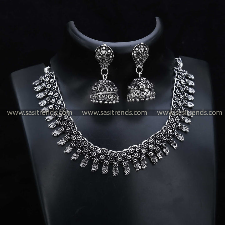 Oxidised Avant-Garde Necklace Set 1208G, featuring fashion-forward jhumka earrings, redefines contemporary style in oxidised jewellery