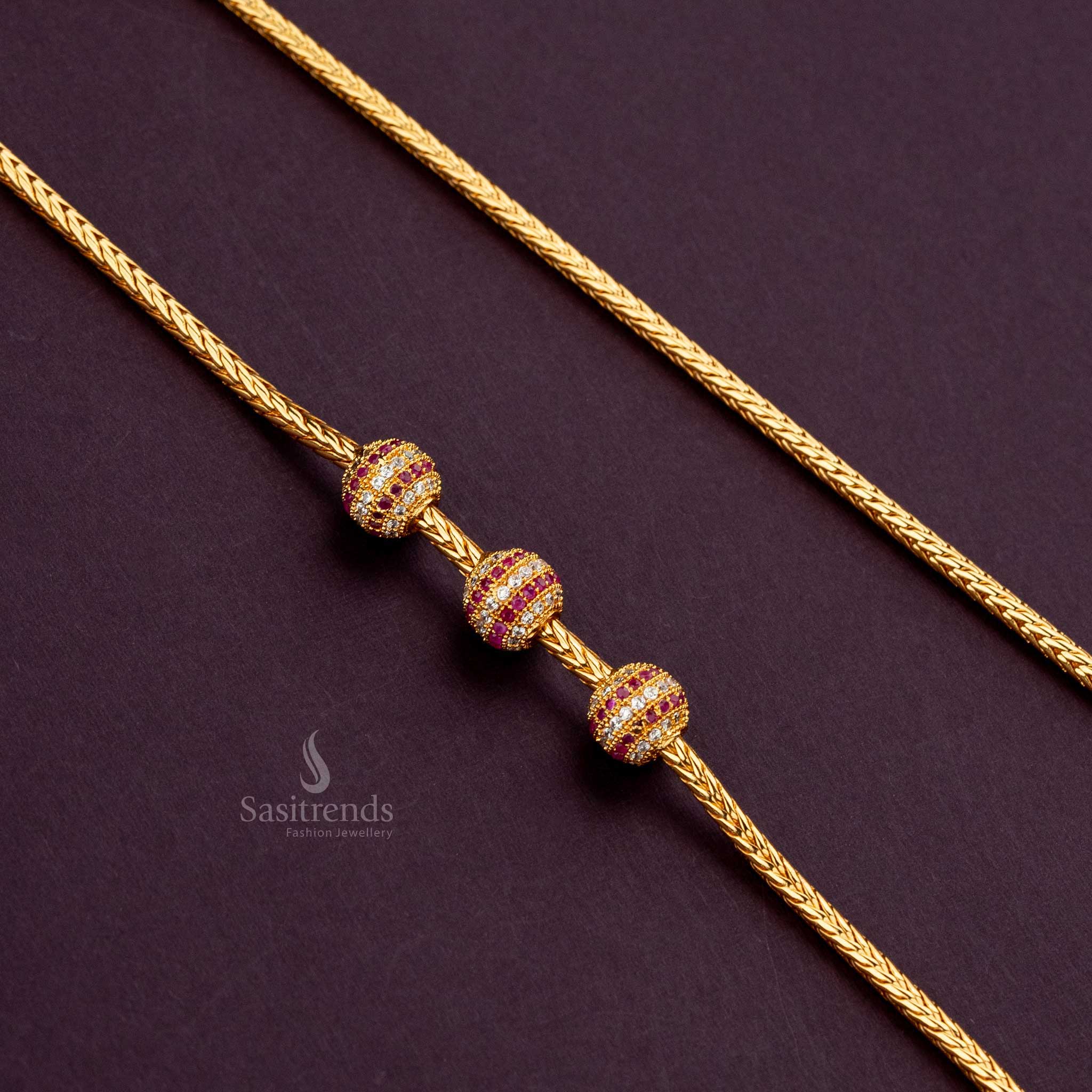 One-gram white-ruby ball mugappu chain, guaranteed gold finish, ideal for pairing with silk sarees - Sasitrends