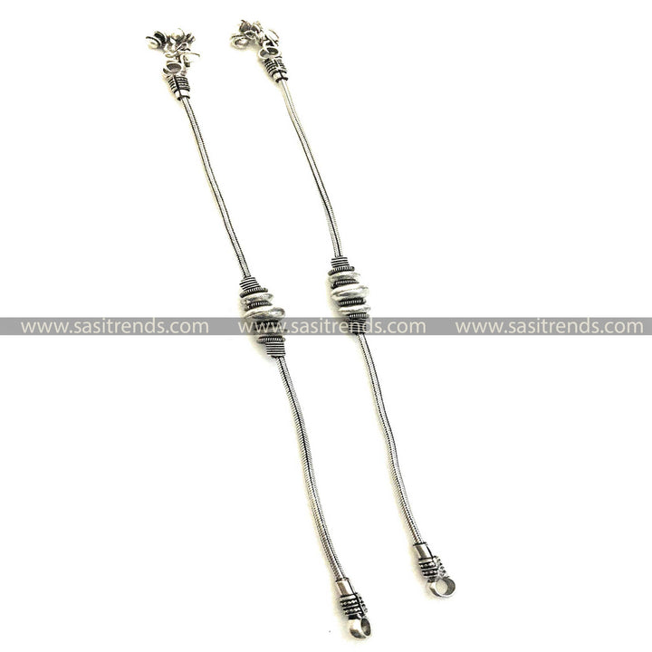 Ethnic-inspired detailed silver beads on oxidised anklets 