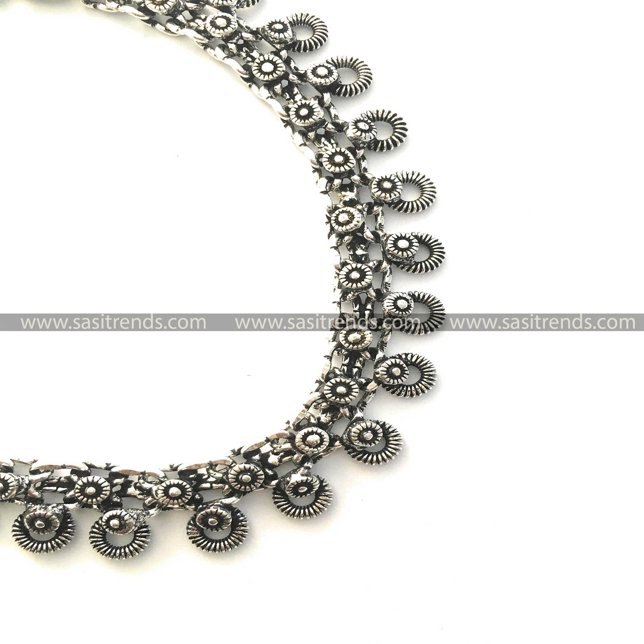 Traditional etched motif oxidised silver anklets with a flexible design 