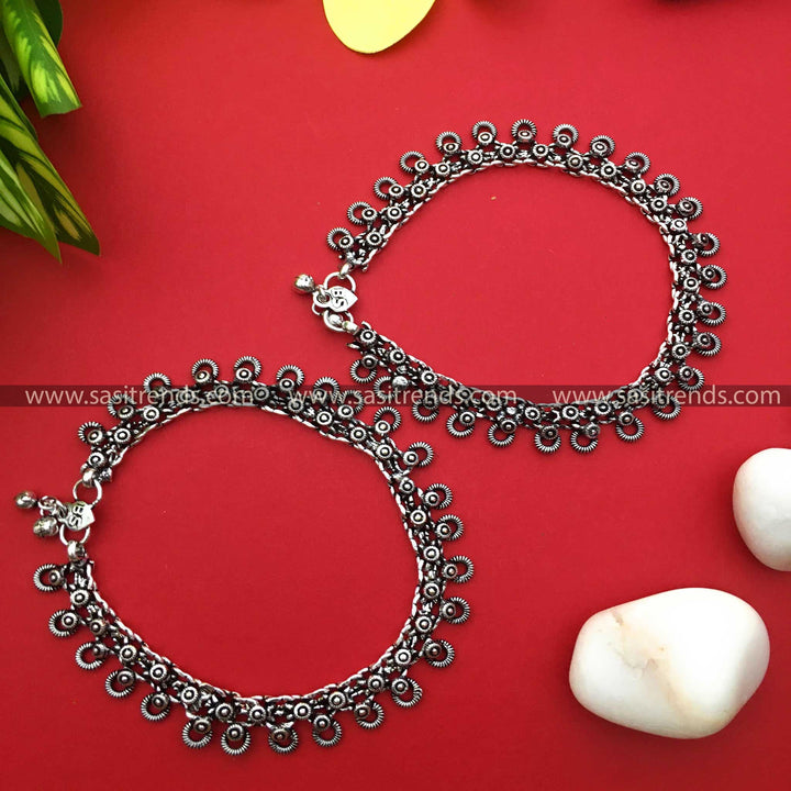 Ornate oxidised silver anklets with circular charm detail and etched motifs sasitrends navarathiri special