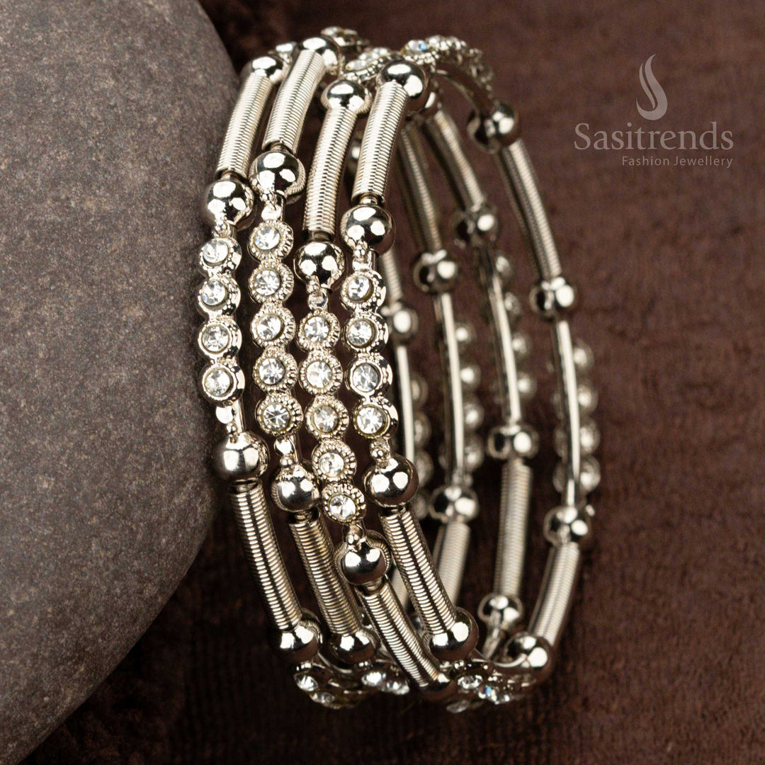 Stylish oxidised bangles featuring fine bead accents and sparkling stones - Sasitrends