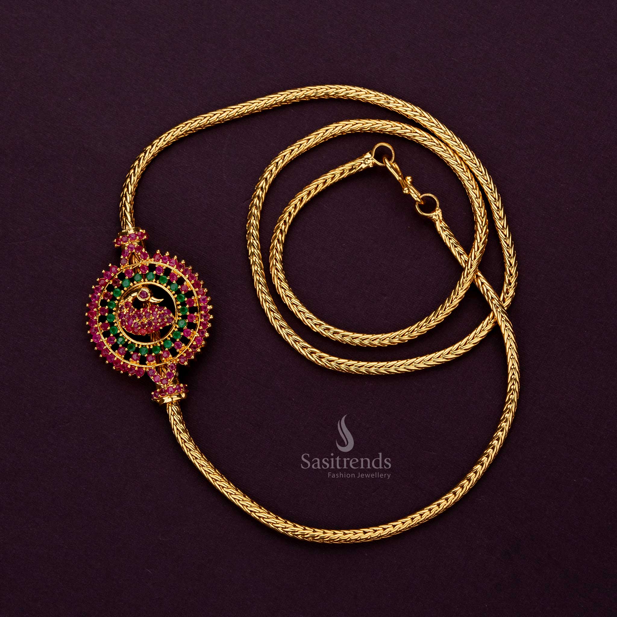 Exquisite ruby-green peacock mugappu chain, accented with AD stones and gold plating, 24 inches - Sasitrends