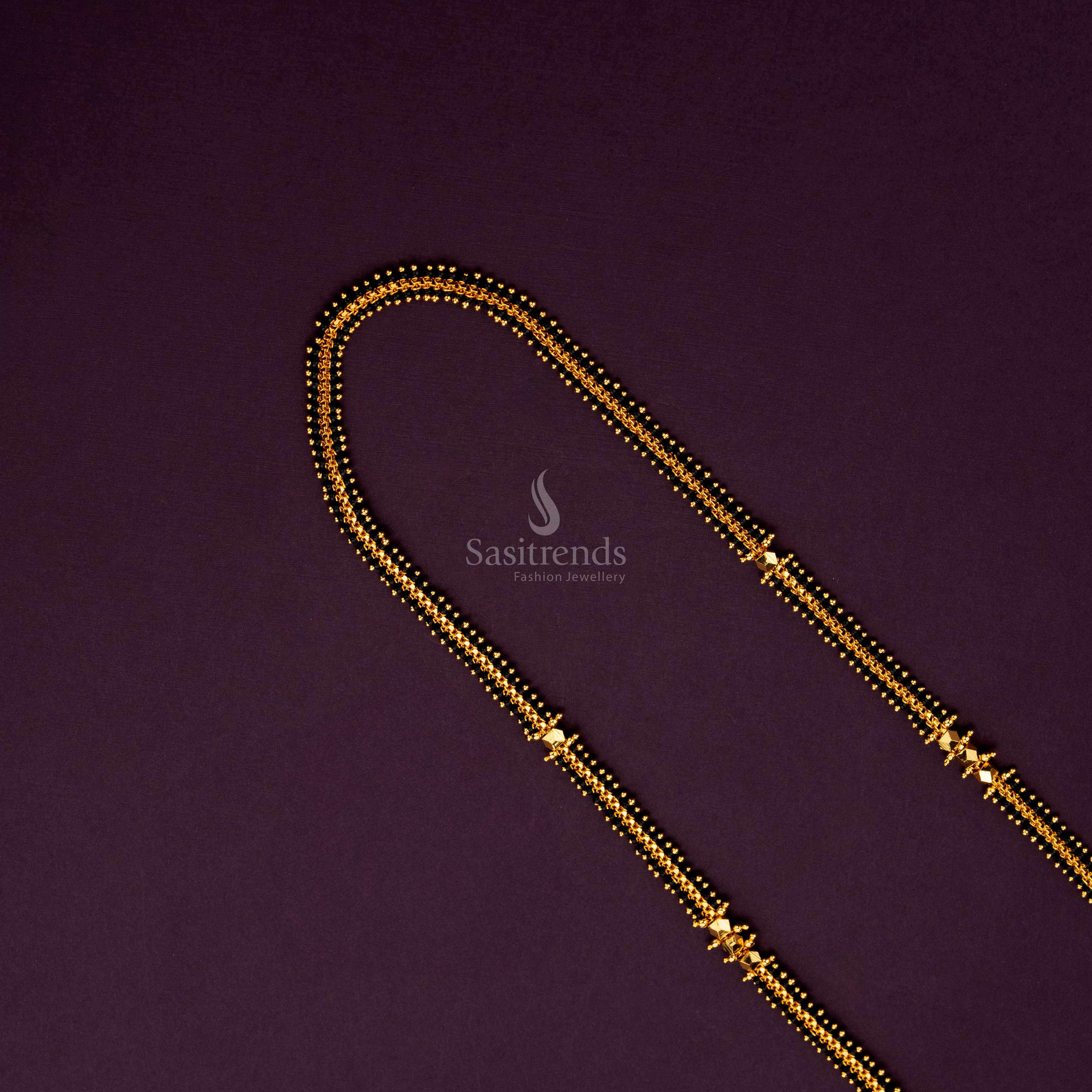 Micro gold plated chain adorned with sleek black beads, perfect for enhancing any outfit - Sasitrends