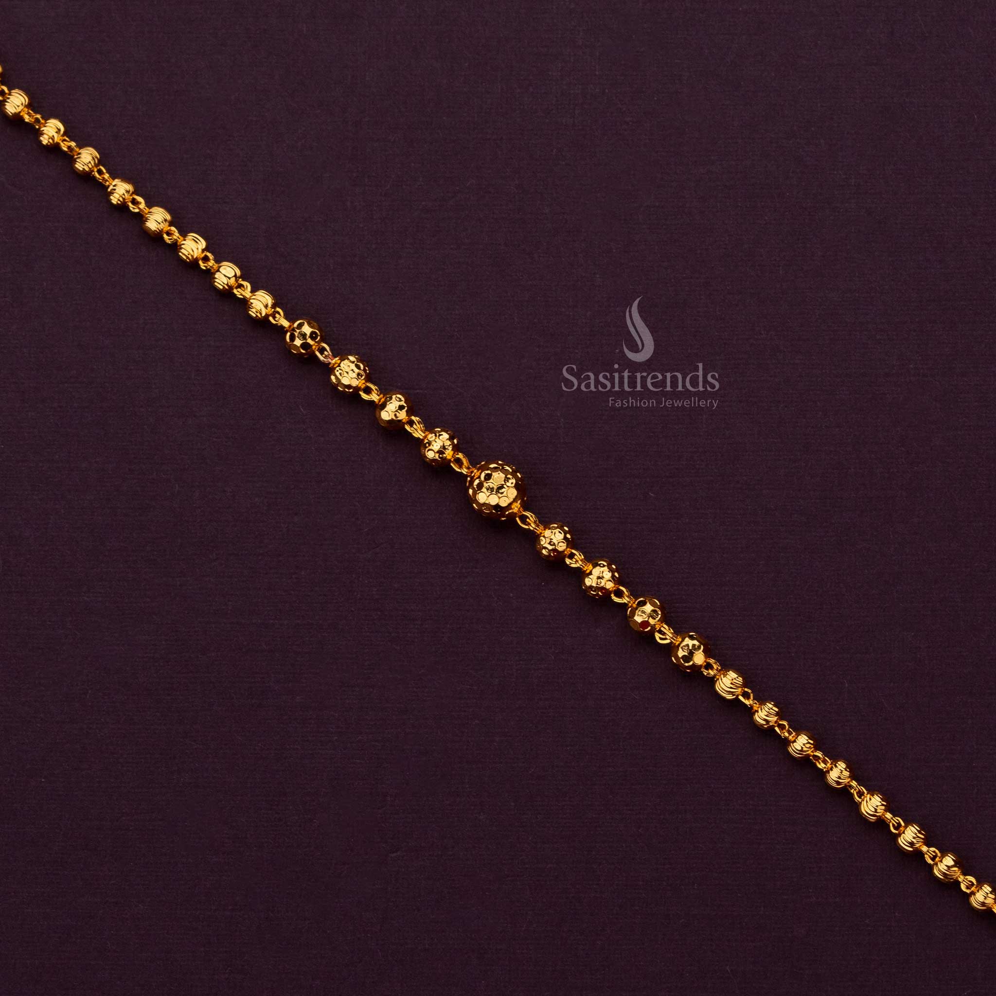 Stylish micro gold plated bracelet adorned with ball design accents - Sasitrends