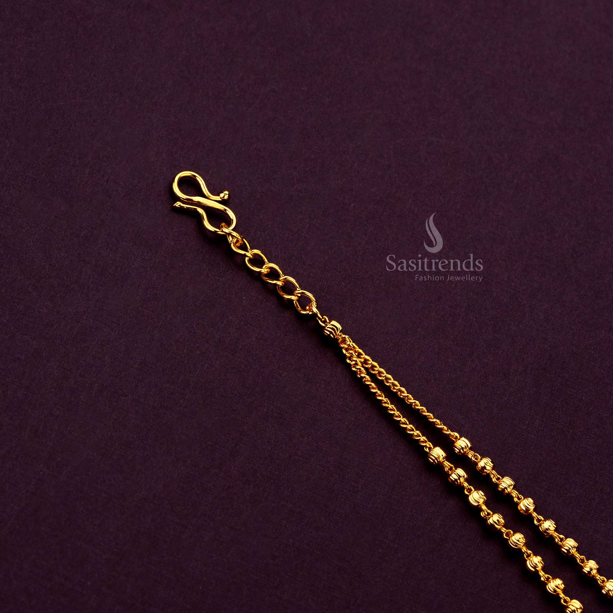 Micro gold plated bracelet with large polished ball accents offering an elegant, modern touch - Sasitrends