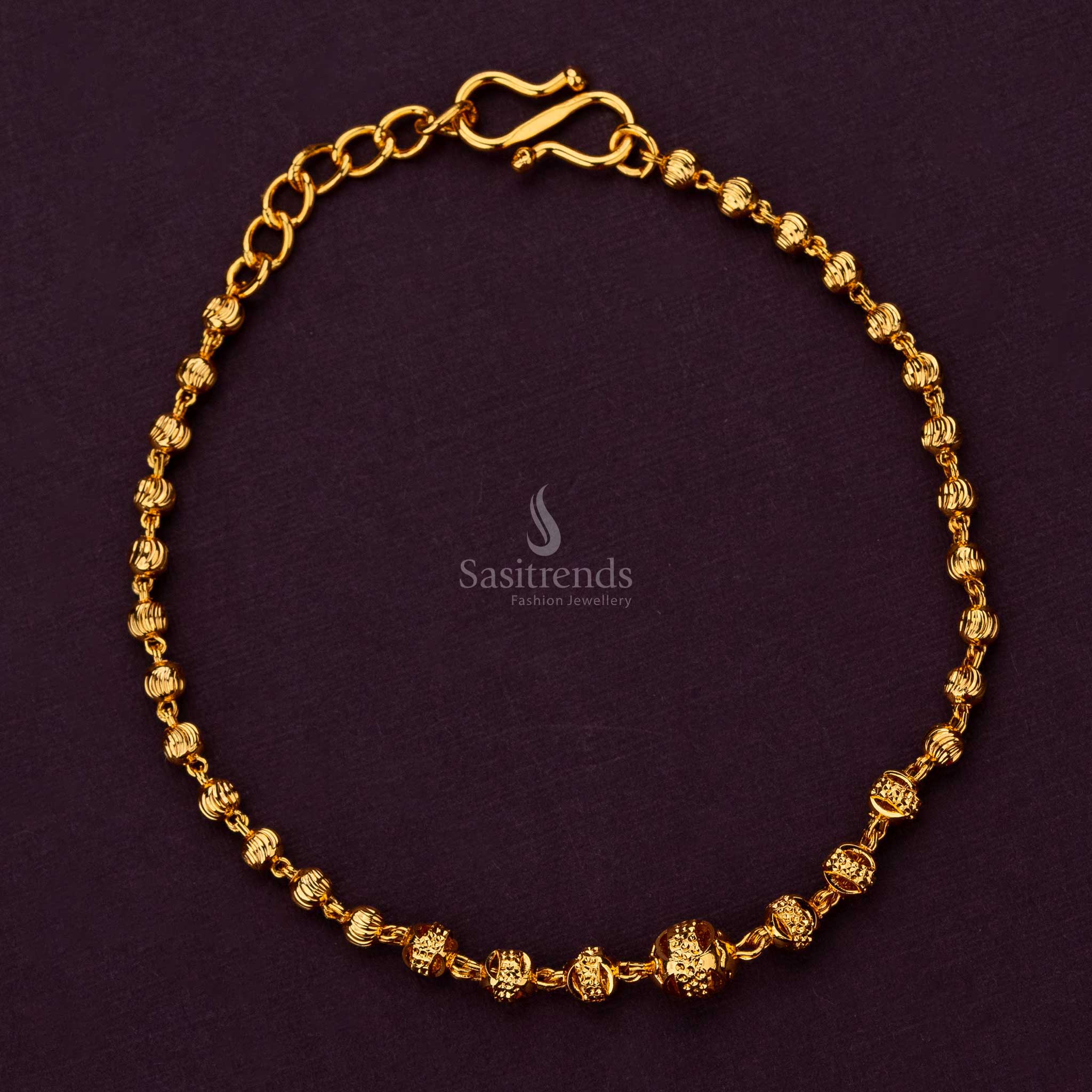 Charming micro gold plated bracelet with intricate ball detailing - Sasitrends