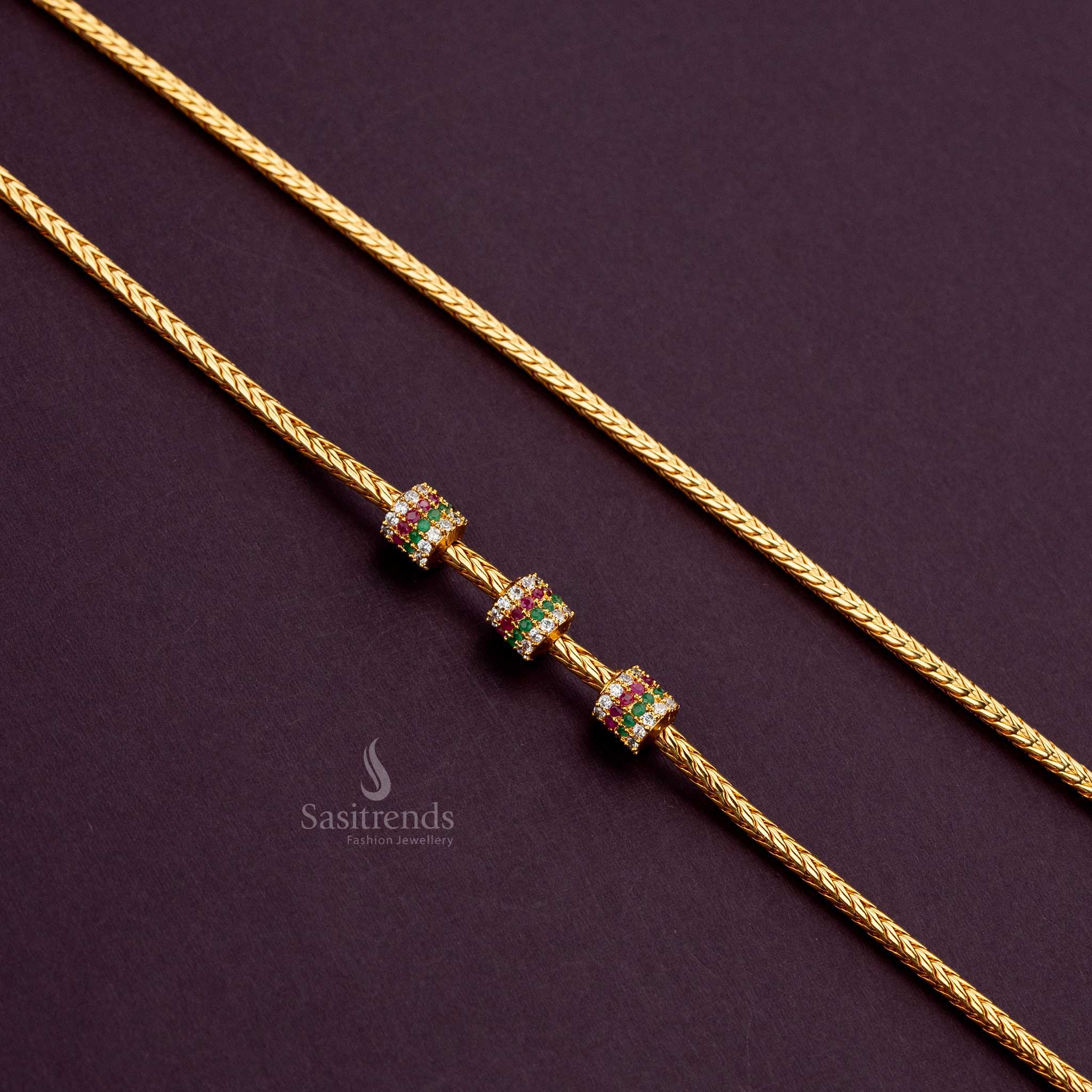 Multi-color cylindrical ball mugappu thali kodi with AD stones, micro gold plated for a traditional look