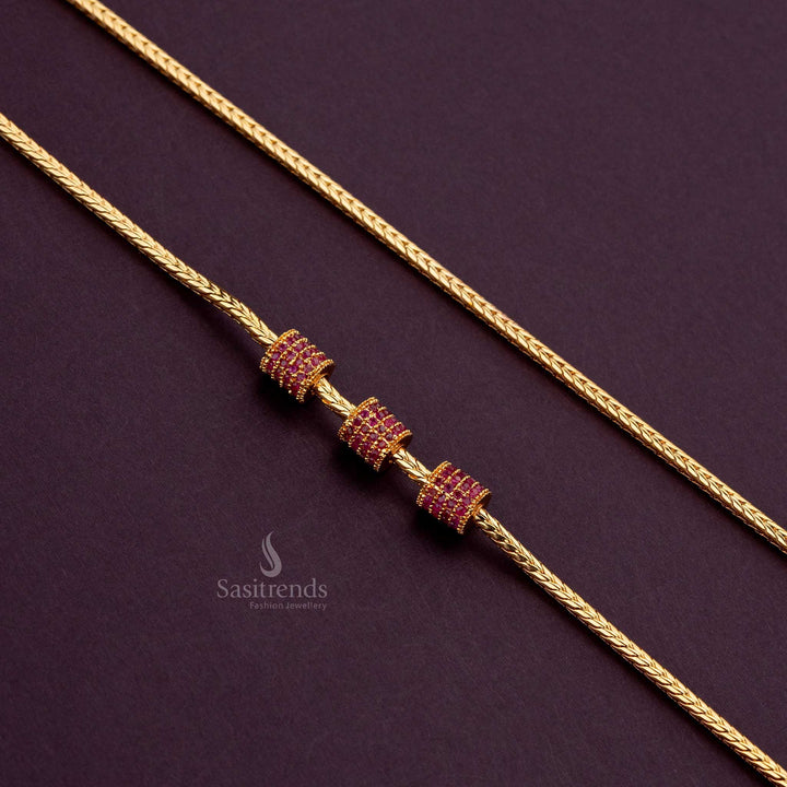 One-gram gold-plated ruby cylindrical mugappu chain, perfect for silk sarees