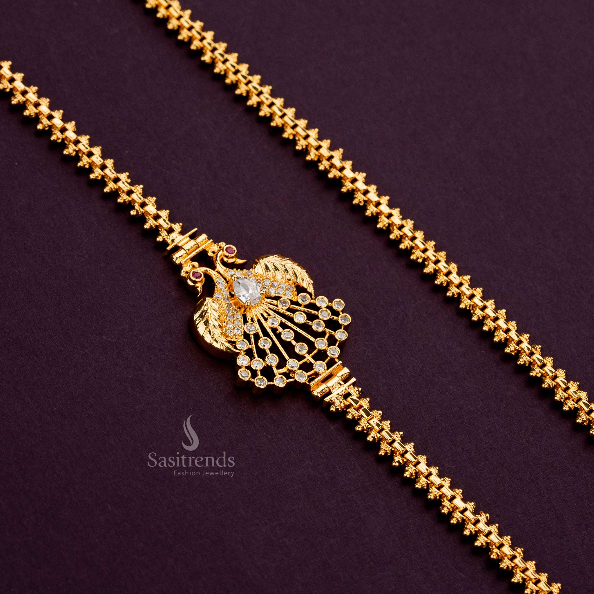 24-carat gold-plated mugappu chain with White AD stones and peacock design - Sasitrends