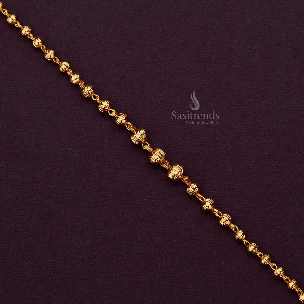 Elegant 1 gram gold plated bracelet with a unique ball design, perfect for sarees - Sasitrends