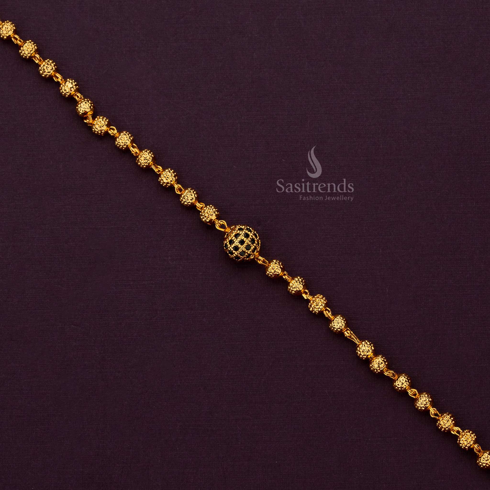 Micro gold plated bracelet with a bold arrangement of ball elements for a standout accessory - Sasitrends