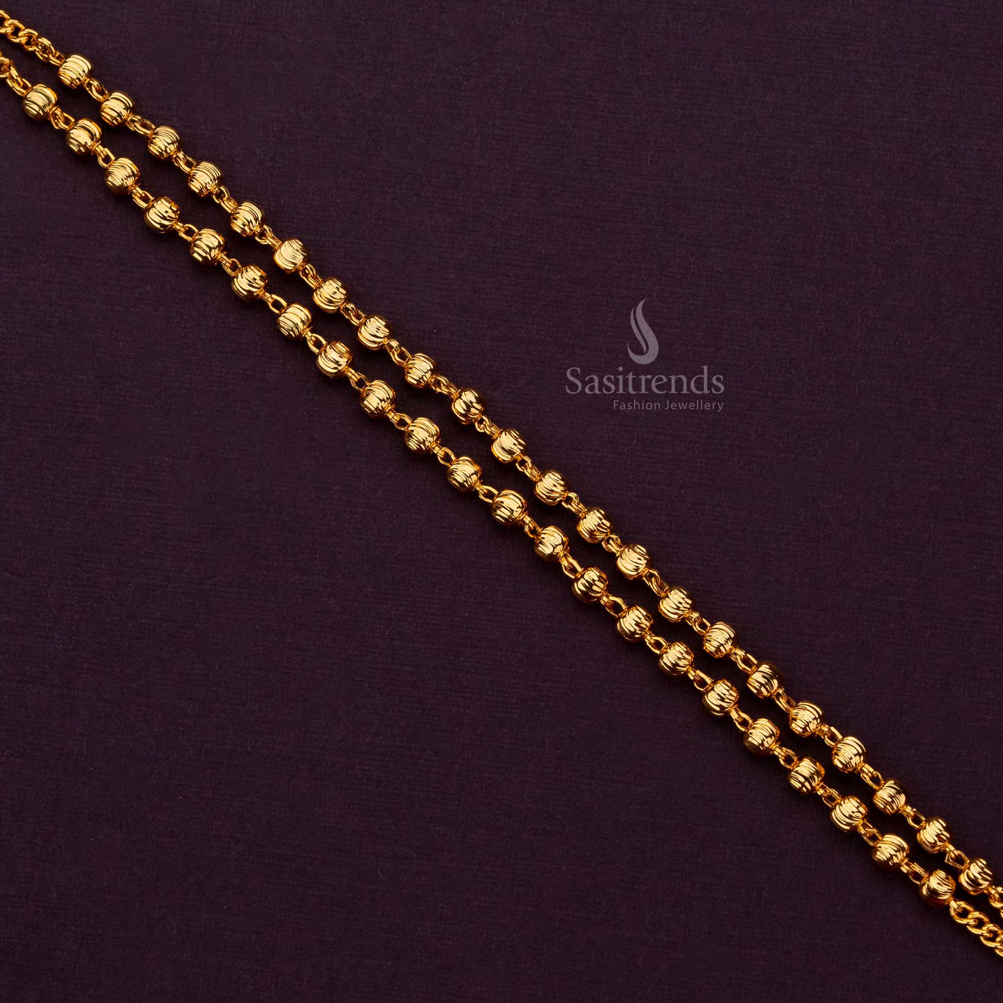 Sleek micro gold plated bracelet with smooth ball detailing, a sophisticated addition to any outfit - Sasitrends