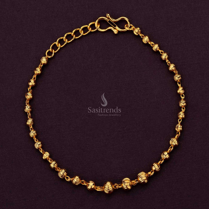 Simple and stylish micro gold plated bracelet adorned with a ball motif - Sasitrends