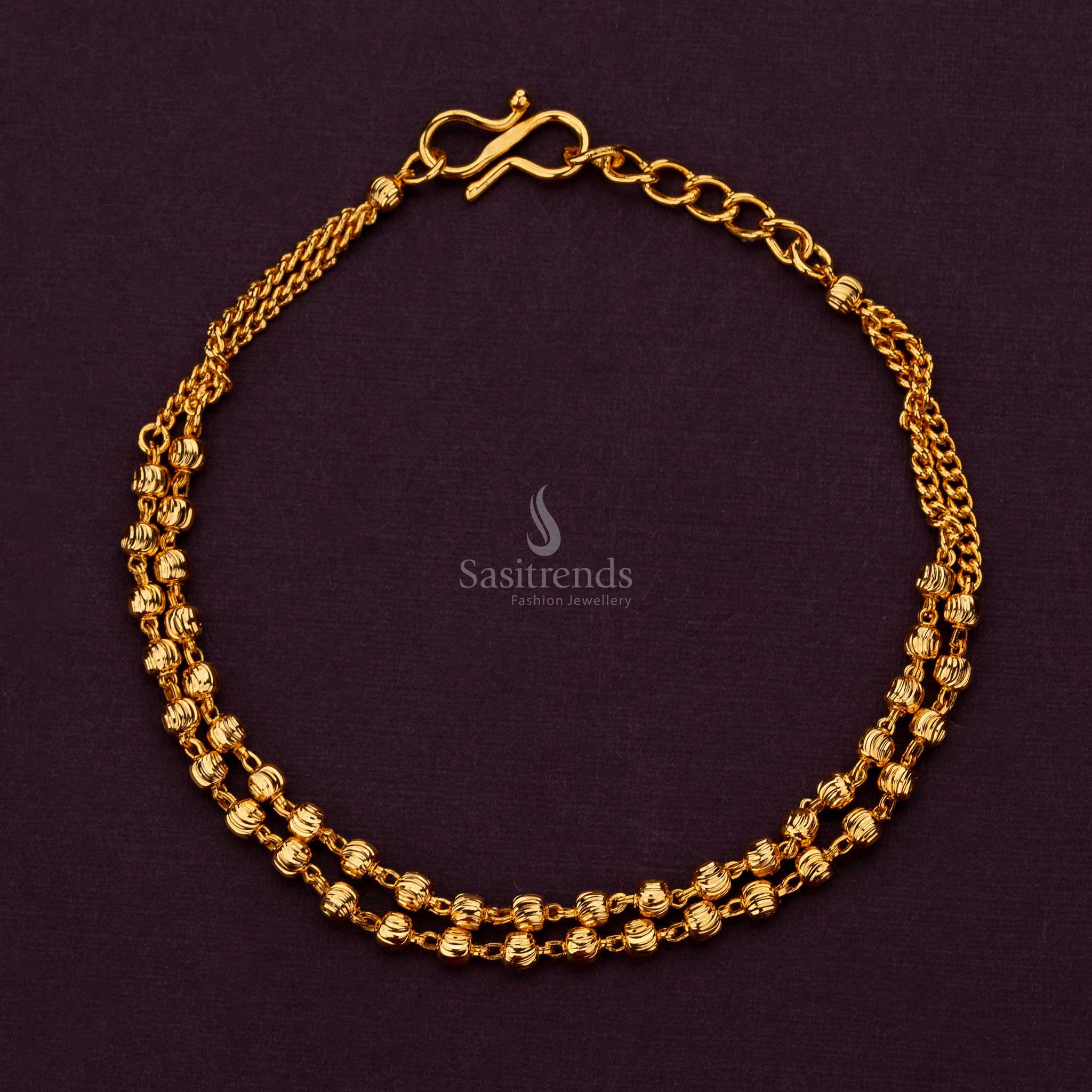 Beautiful micro gold plated bracelet featuring a classic ball design - Sasitrends