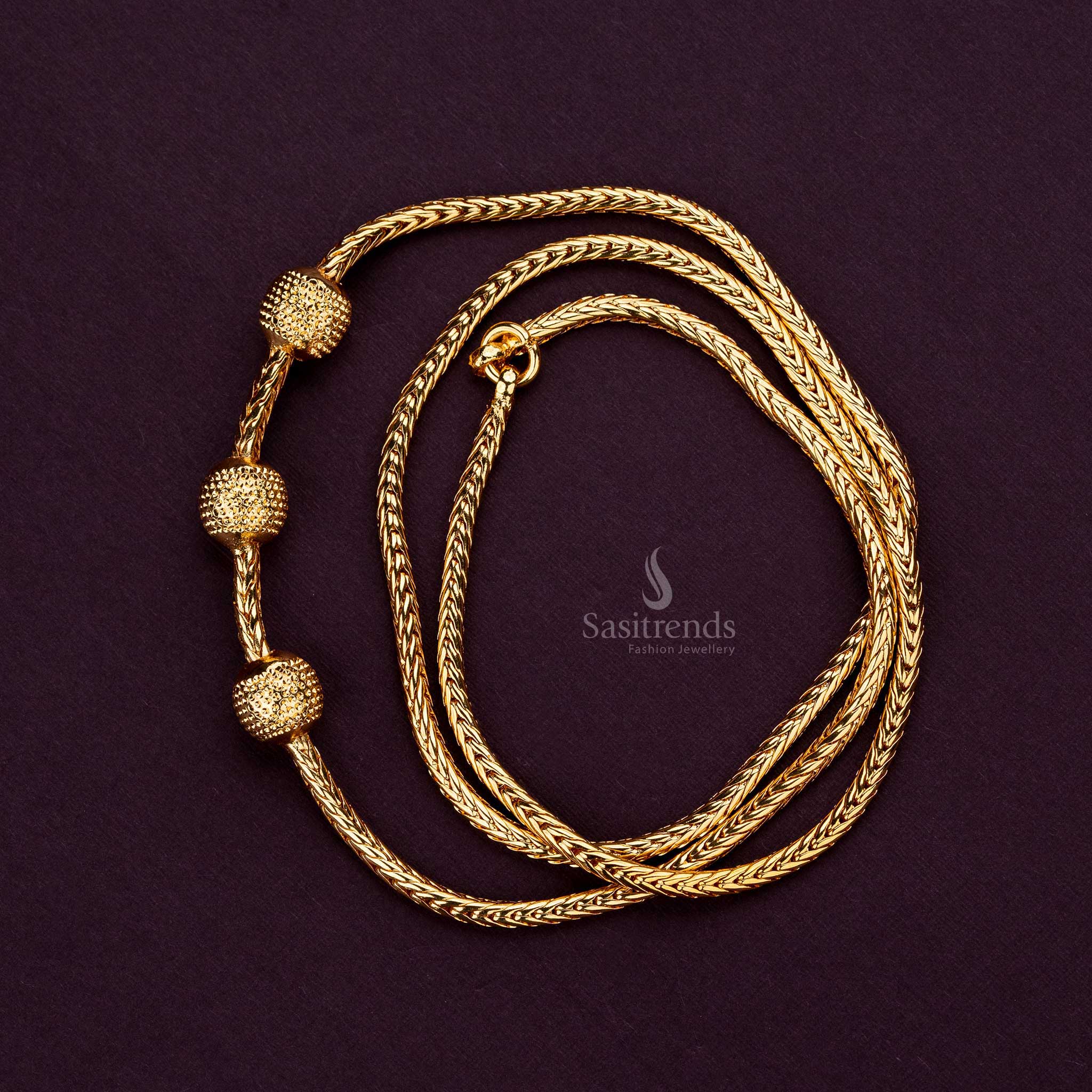 Stunning micro gold-plated ball design mugappu chain on display - Sasitrends