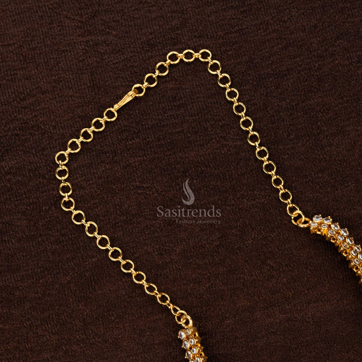 Intricately designed gold-plated necklace with sparkling white stones and red accents, ideal for special occasions - Sasitrends