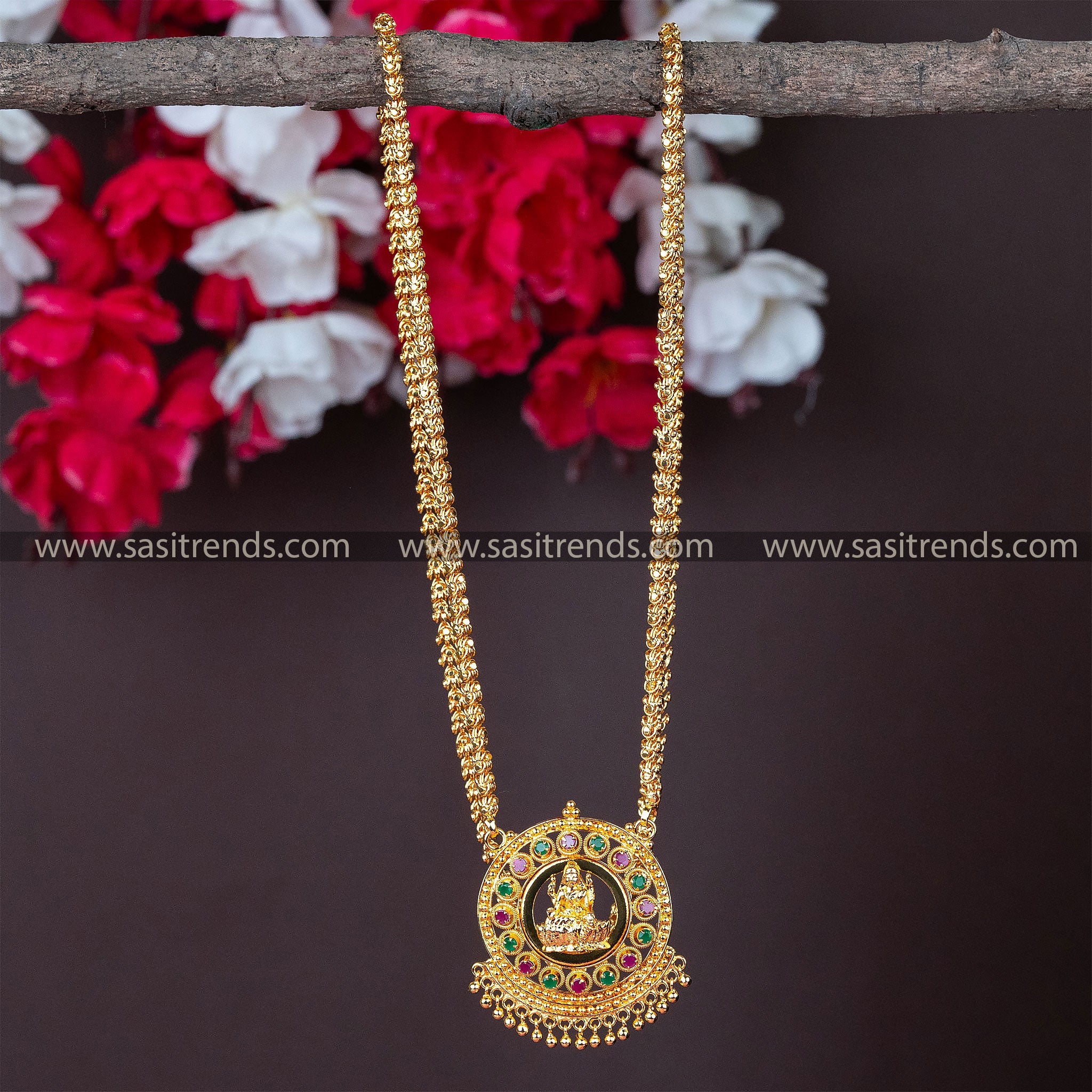 Micro gold-plated chain necklace with a Lakshmi motif pendant, surrounded by radiant full ruby AD stones