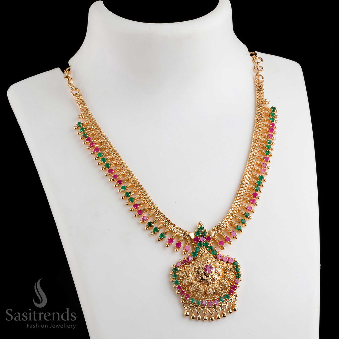 Stunning graceful temple-inspired micro gold plated tilak pendant ruby-green necklace featuring an intricate traditional design - Sasitrends