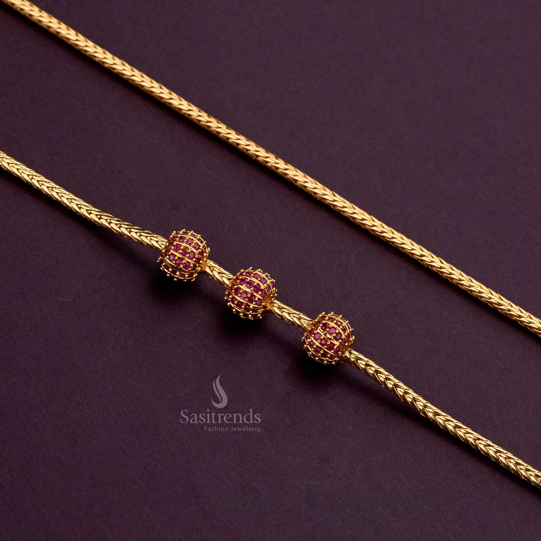 Luxurious 24K gold finish mugappu chain with Ruby AD stones, ideal for gifting - Sasitrends