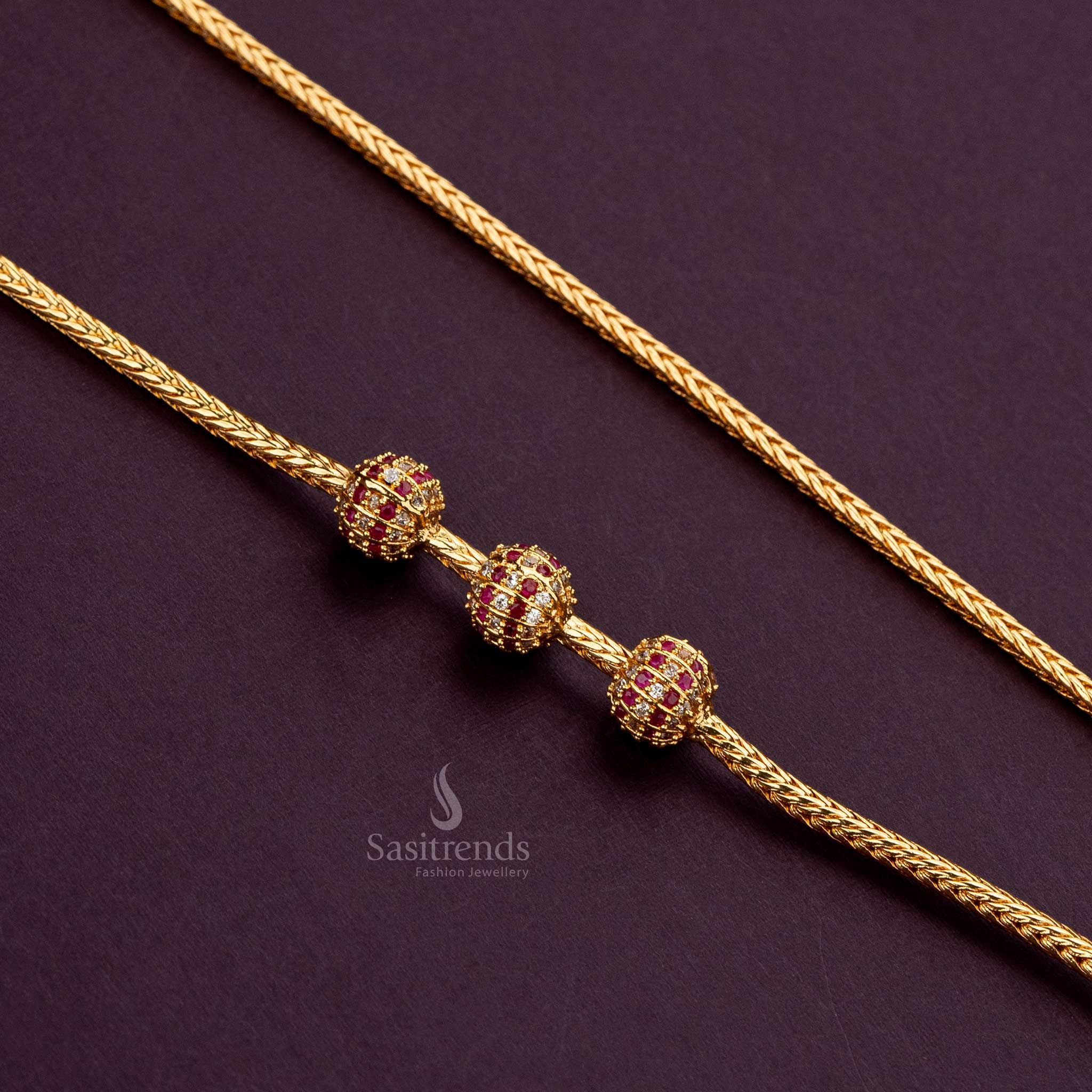 Luxurious 24K gold finish mugappu chain with white Ruby AD stones, ideal for gifting - Sasitrends