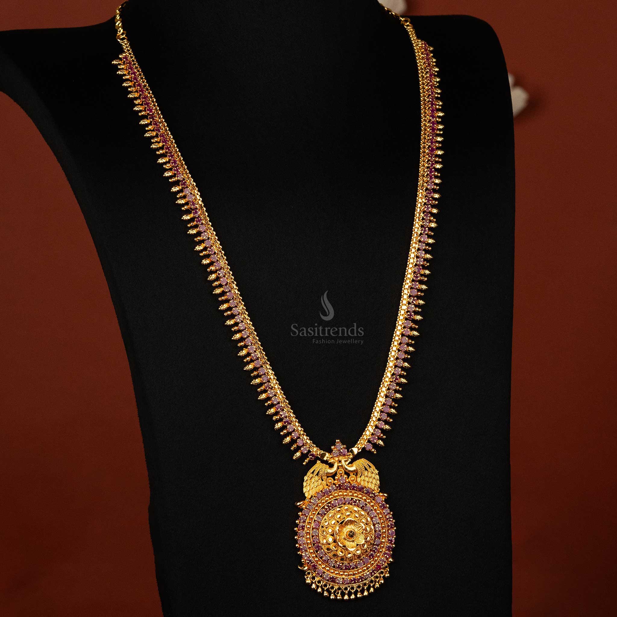 Stunning 1 gram gold plated haram with ruby AD stones and gold peacock pendant  